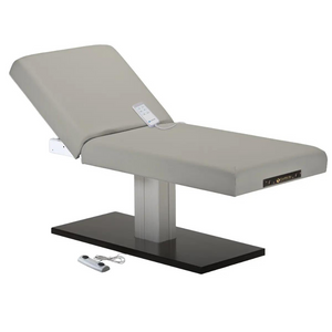 Earthlite Everest Spa Pedestal Electric Tilt Table Sterling with cushioned top and single-column electric base, showing adjustable tilt feature for professional Med Spa and wellness treatments.