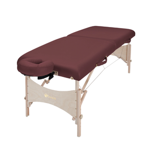 Earthlite Harmony DX Portable Massage Table with Burgundy upholstery for wellness practices