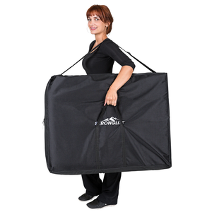 Earthlite Stronglite Olympia Portable Massage Table illustrating a model with the heavy duty carry case.