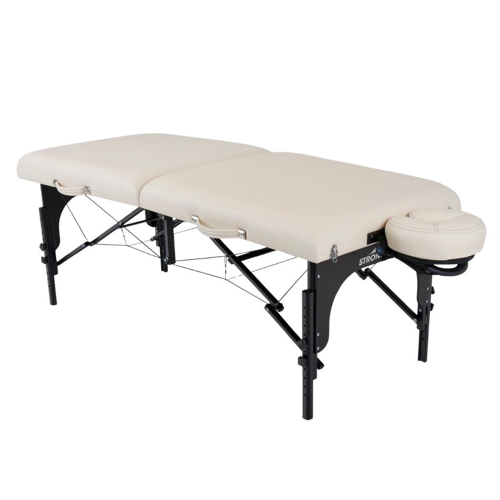 Earthlite Stronglite Premier Portable Massage Table with Vanilla Creme upholstery for wellness practices.