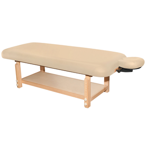 Earthlite Terra stationary massage treatment table with beige upholstery for med spa and medical wellness practices.