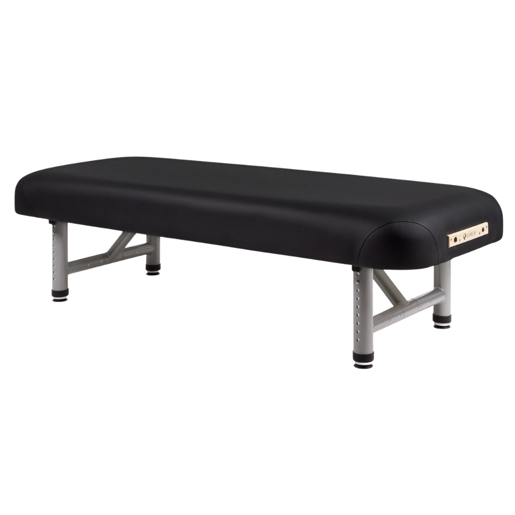 Earthlite Yosemite 30 Low Height Treatment Table with black upholstery for med spa and medical wellness practices.