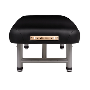 Earthlite Yosemite 30 Low Height Treatment Table end view showing sturdy frame and low height design for med spa and medical wellness practices.
