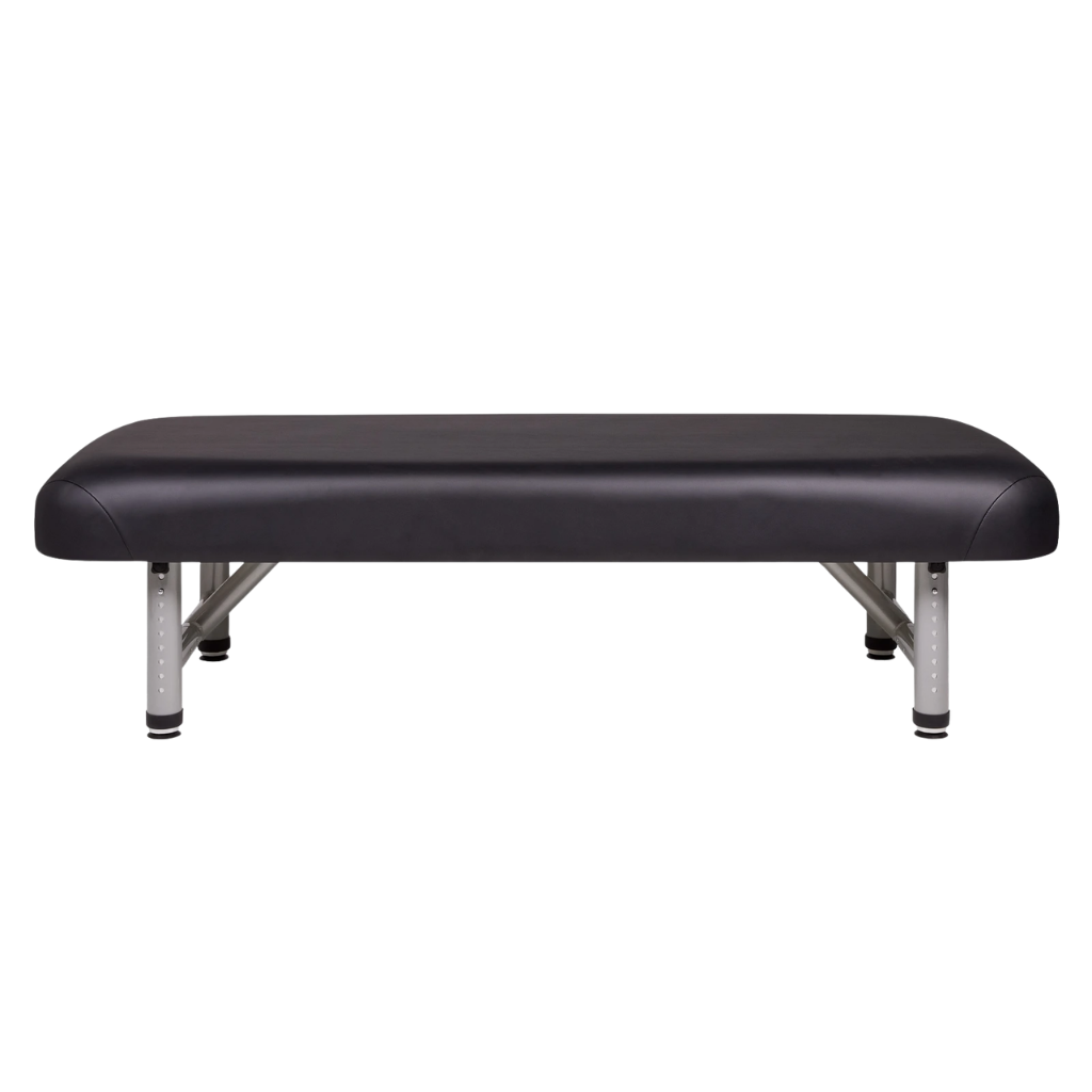 Earthlite Yosemite 30 Low Height Treatment Table end view showing sturdy frame and low height design for med spa and medical wellness practices.
