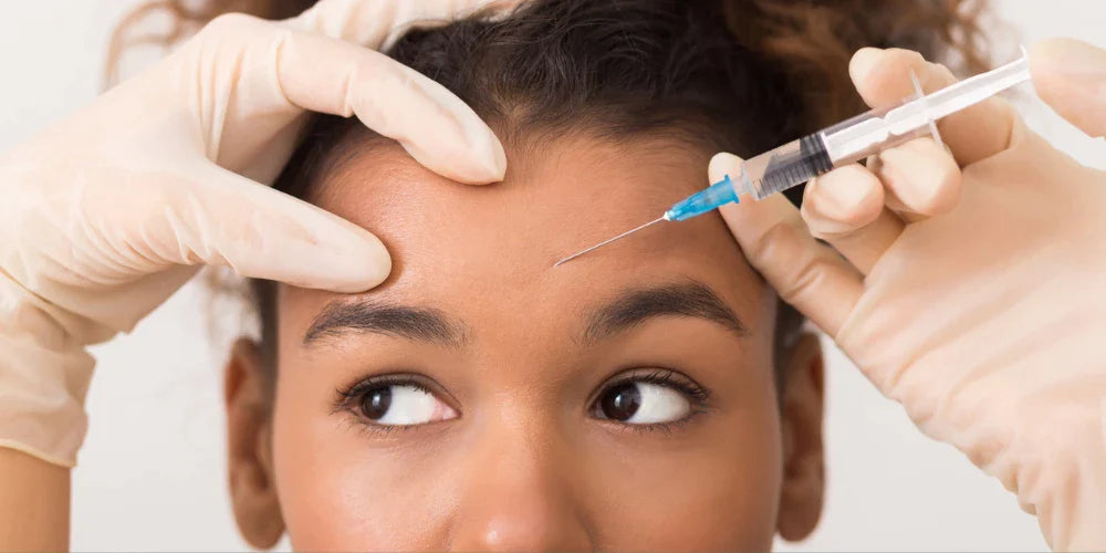 Facial treatment with needle injections administered by a professional for rejuvenation and skincare