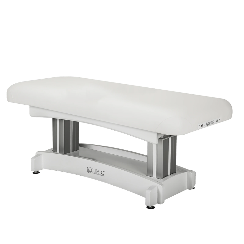 The LEC Aspen™ Spa Treatment Table with White Lacquer Base and White Upholstery.