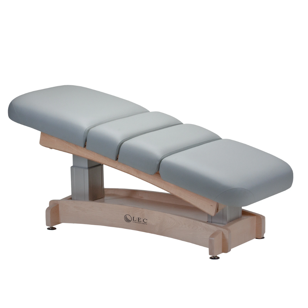 The LEC Aspen™ Spa Treatment Table illustrating the Salon top with Trendelenburg Tilt.