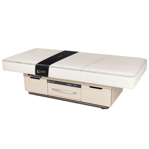 LEC Century City™ Dual-Pedestal Low-Range Treatment Table with Digital Warming Drawer illustrating the flat bed and closed drawers and cabinets.