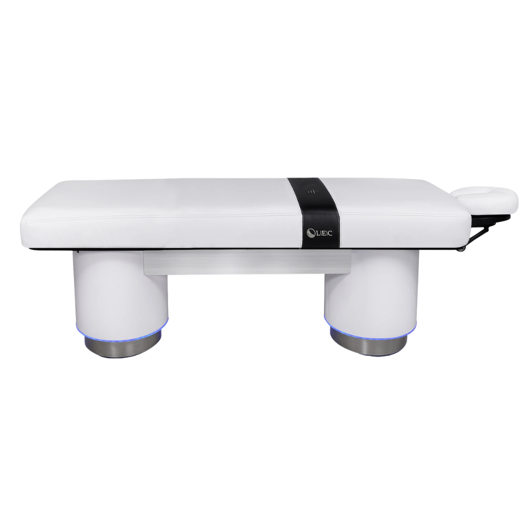 LEC INSIGNIA 2.0 ELLIPSE™ multi-purpose treatment table with a replaceable mattress, ergonomic cushioning, and a durable design ideal for Med Spas and wellness practices illustrating the side view with the Strata Facepillow.