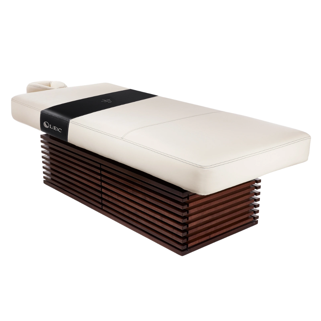 LEC INSIGNIA 2.0 MODERN™ multi-purpose treatment table with a replaceable mattress, ergonomic cushioning, and a durable design ideal for Med Spas and wellness practices illustrating the table with Strata facepillow.