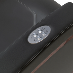 LEC Mind-Sync 2.0 Harmonic Wellness Lounger in a modern Med Spa setting, featuring a fully reclined ergonomic design with integrated harmonic sound and vibration technology for IV hydration and medical wellness treatments illustrating the armrest controls.