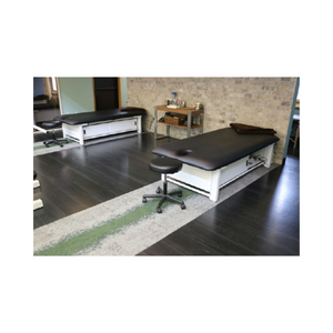 Elevating Treatment Table in office