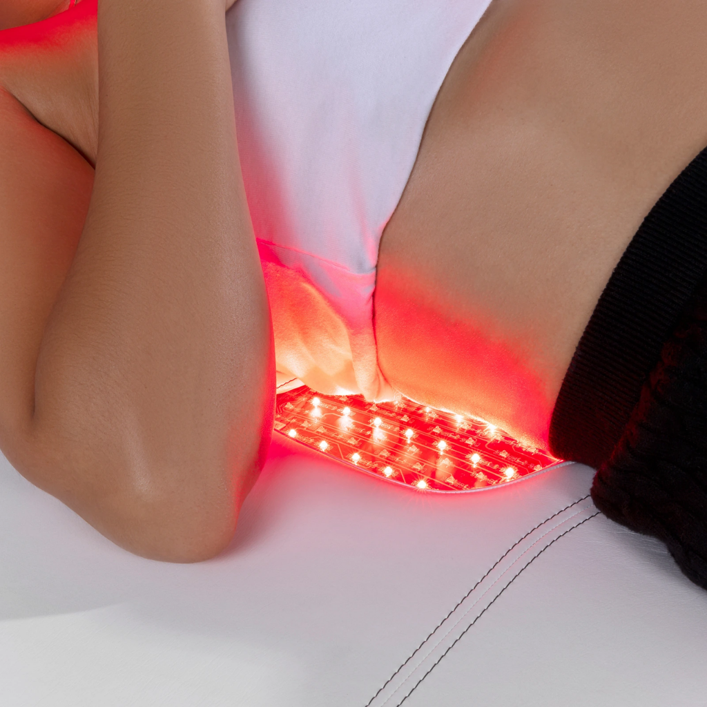 Radiance PT Pulsed LED Light Therapy Treatment Table illustrating the back panel lit with model.