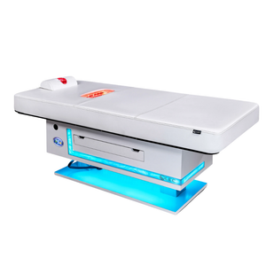 Radiance PT Pulsed LED Light Therapy Treatment Table with neck roll and back panel lit.