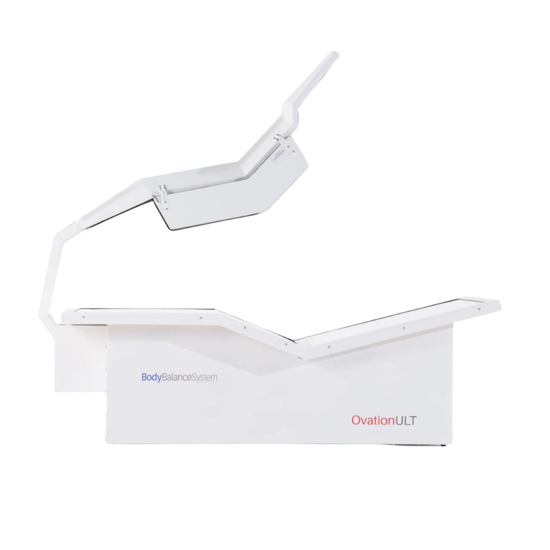 Body Balance System Ovation ULT red light therapy bed on a white background with door open