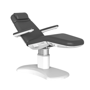 Grey ergonomic medical spa chair with adjustable armrests and footrest on a white background