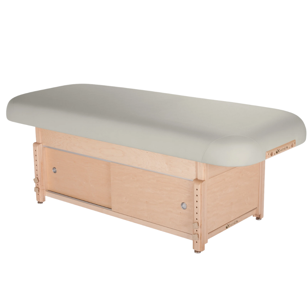 Earthlite Sedona Flat Top Spa & Massage Table with Sterling upholstery and enclosed cabinet base for storage in med spa and medical wellness practices.