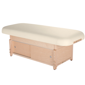 Earthlite Sedona Flat Top Spa & Massage Table with Vanilla Creme upholstery and enclosed cabinet base for storage in med spa and medical wellness practices.