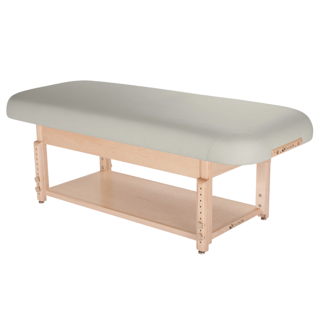Earthlite Sedona Flat Top Spa & Massage Table with Sterling upholstery and open shelf base for storage in med spa and medical wellness practices.