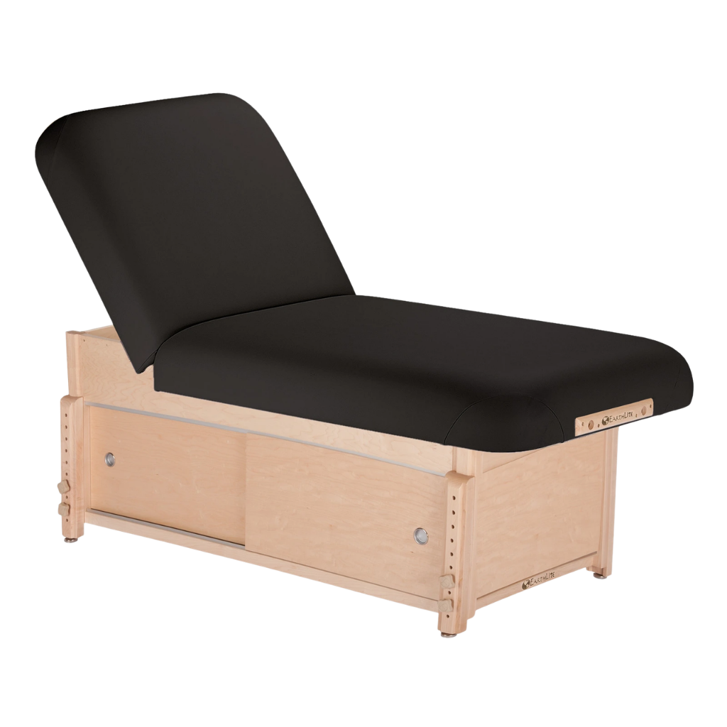 Earthlite Sedona Manual Tilt Massage Table with black upholstery and enclosed cabinet base for storage in med spa and medical wellness practices.