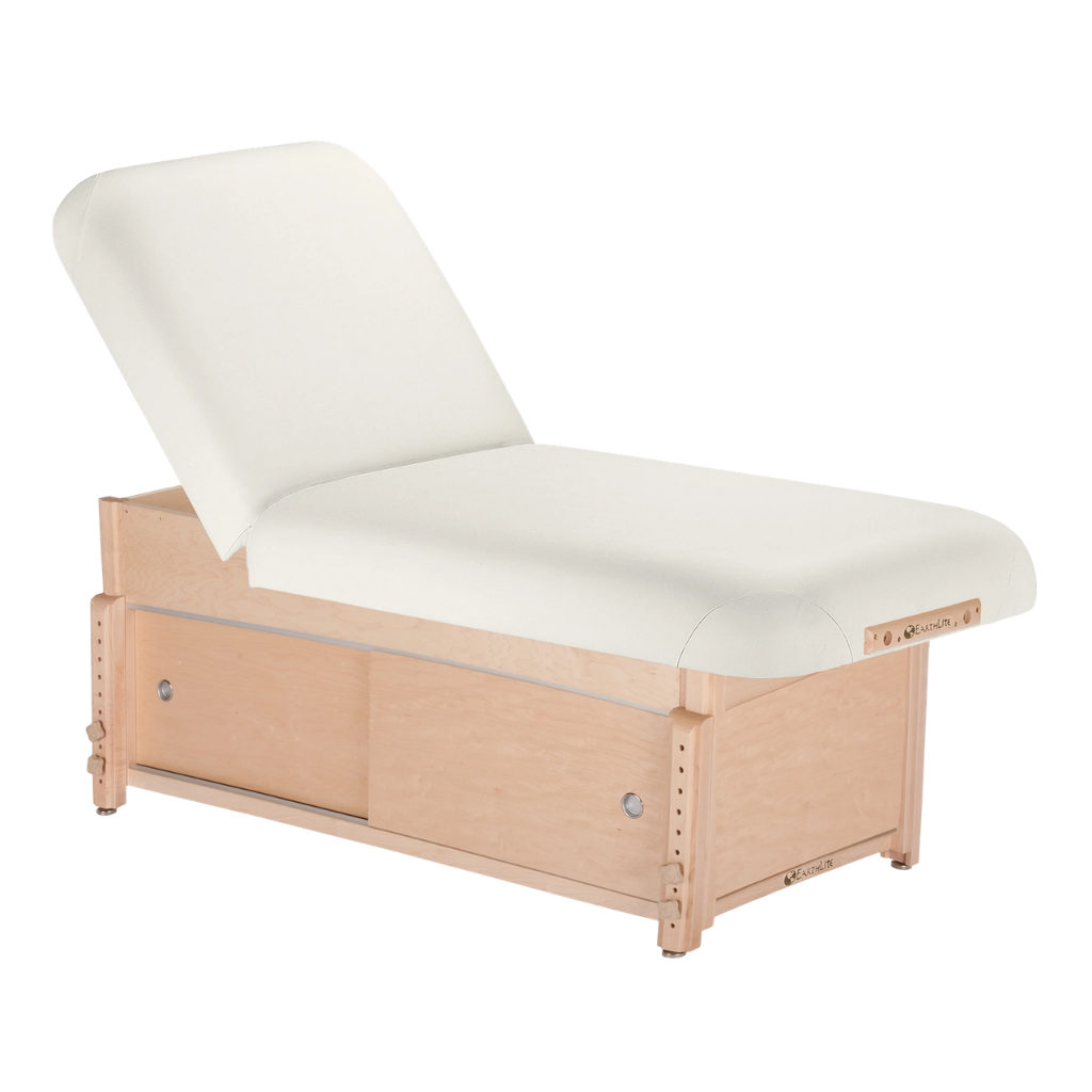 Earthlite Sedona Manual Tilt Massage Table with White upholstery and enclosed cabinet base for storage in med spa and medical wellness practices.