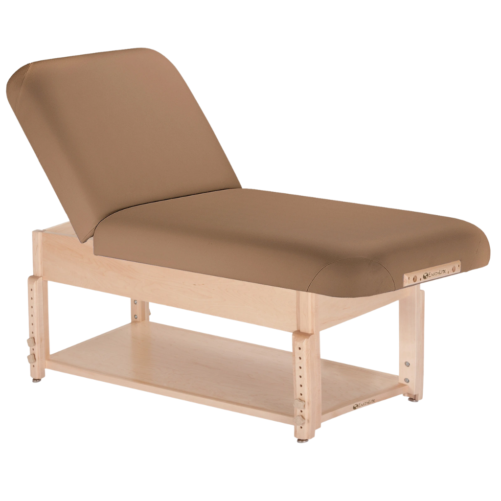 Earthlite Sedona Manual Tilt Massage Table with Latte upholstery and open shelf base for storage in med spa and medical wellness practices.