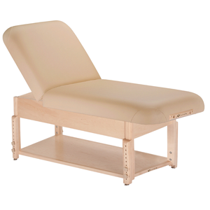Earthlite Sedona Manual Tilt Massage Table with Marie's Beige upholstery and open shelf base for storage in med spa and medical wellness practices.
