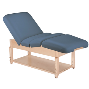 Earthlite Sedona Pneumatic Salon Massage Table with Mystic Blue upholstery and open shelf base for storage in med spa and medical wellness practices.