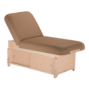 Earthlite Sedona Pneumatic Tilt Massage Table with Latte upholstery and cabinet base for storage in medical wellness and med spa practices.