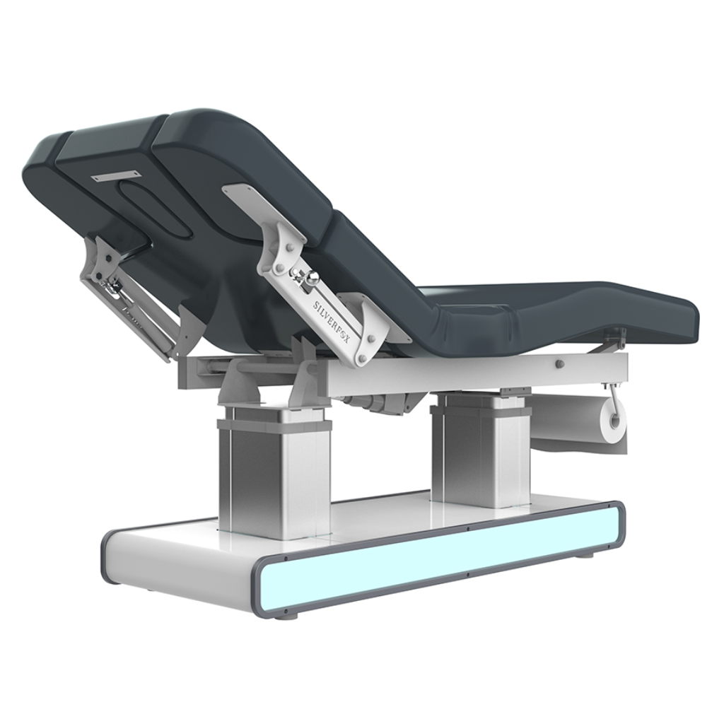 Rear view of Silverfox Serene Wellness & Spa Table (2275)  with adjustable backrest, footrest, and armrests, featuring a sturdy metal base, smooth vegan leather upholstery, and a comfortable headrest for facials and spa treatments.