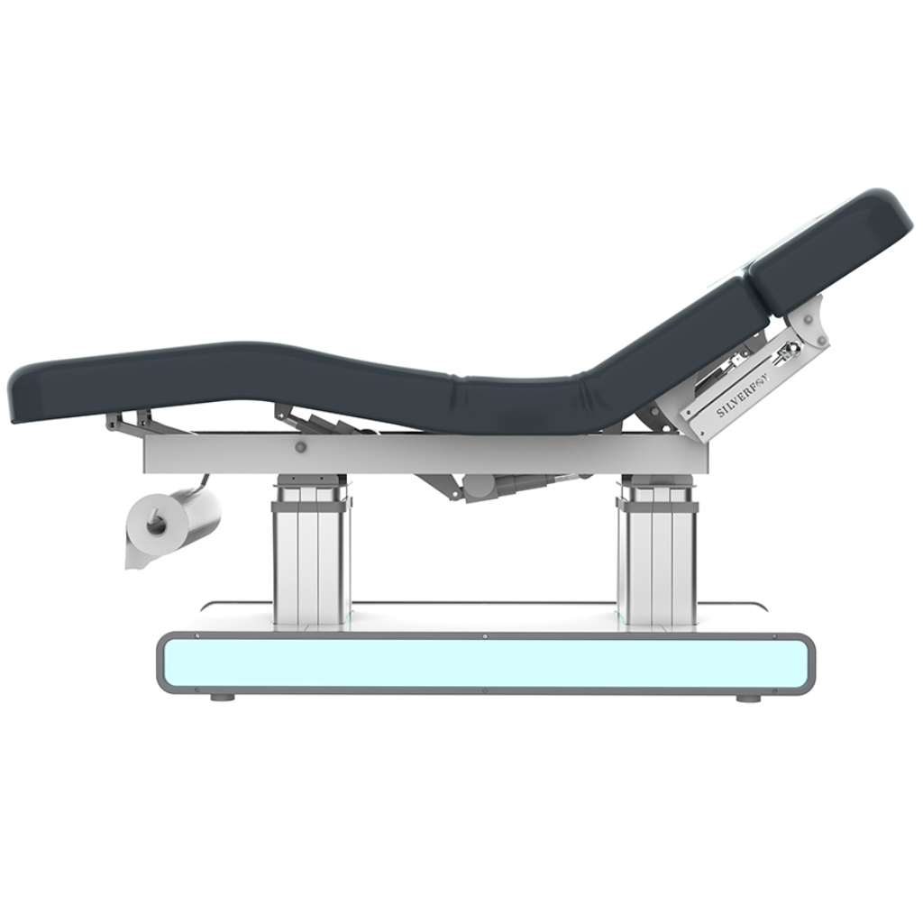 Right view of Silverfox Serene Wellness & Spa Table (2275)  with adjustable backrest, footrest, and armrests, featuring a sturdy metal base, smooth vegan leather upholstery, and a comfortable headrest for facials and spa treatments.