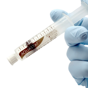 Sodium Chloride Flush Syringes 0.9% 10mL in Gloved Hand