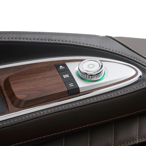Super Novo 2.0 Massage Chair with zero-gravity recline for med spa and IV hydration recovery areas illustrating the armrest controls for the JBL sound system.