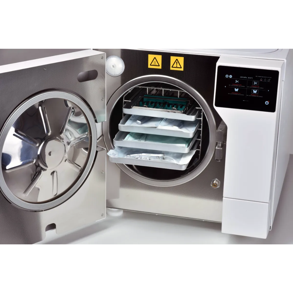 Interior view of the Tuttnauer T-Top Autoclave Sterilizer Series featuring a  stainless steel chamber designed for high-volume instrument loads and fast sterilization cycles in Med Spas.