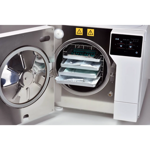 Interior view of the Tuttnauer T-Top Autoclave Sterilizer Series featuring a  stainless steel chamber designed for high-volume instrument loads and fast sterilization cycles in Med Spas.